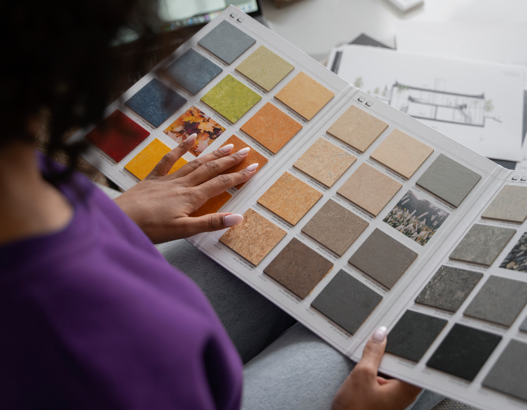 Design professionals sharing ideas around a table